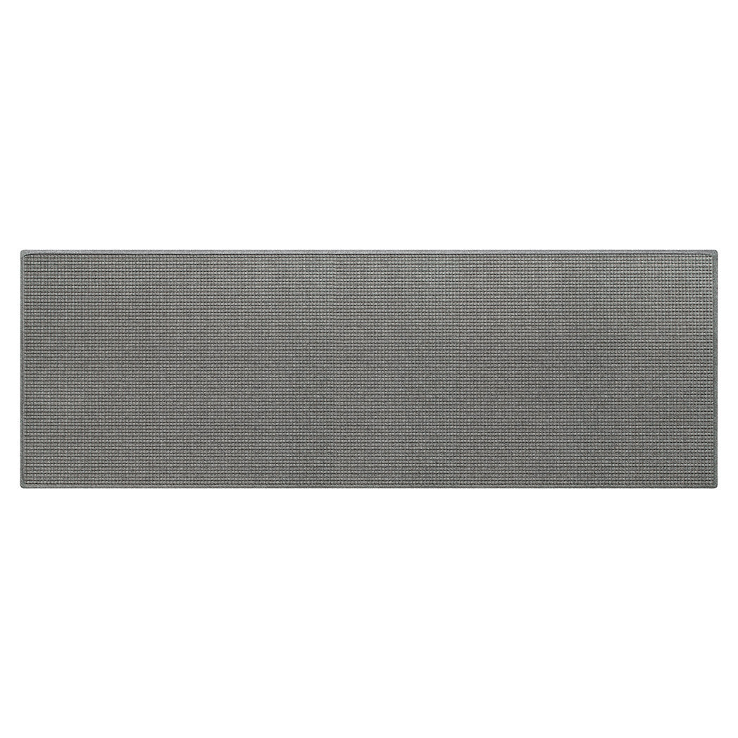 An authentic WaterHog squares doormat in extra large and wide size, in a light grey eco-friendly PET surface on durable rubber backing.