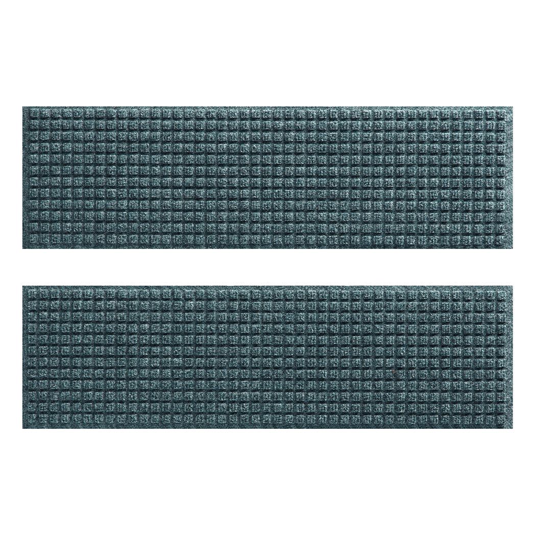 Pair of WaterHog all-weather stair treads in repeating squares design in a light blue/grey, stain-resistant surface.