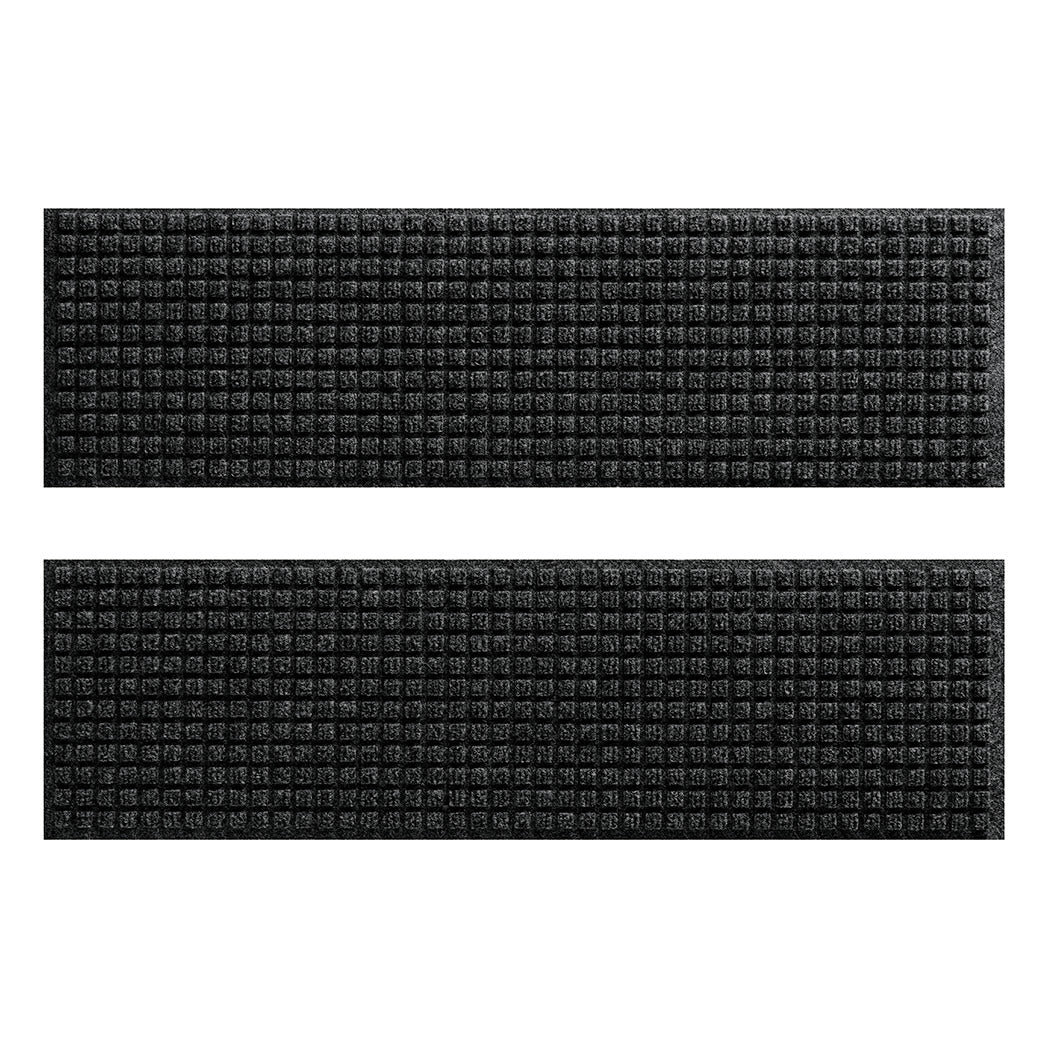 WaterHog squares protective stair treads with a deep grey, uniform grid design; an American-made mat.