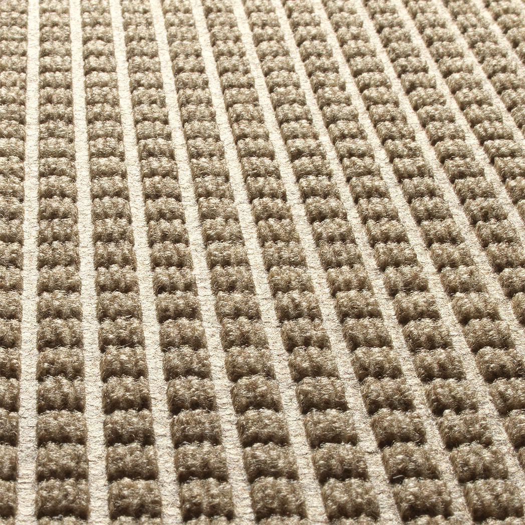 Close-up detailed image of WaterHog  Squares bi-level surface made of light tan recycled PET for a fade and stain-resistant mat.