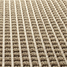 Close-up detailed image of WaterHog  Squares bi-level surface made of light tan recycled PET for a fade and stain-resistant mat.