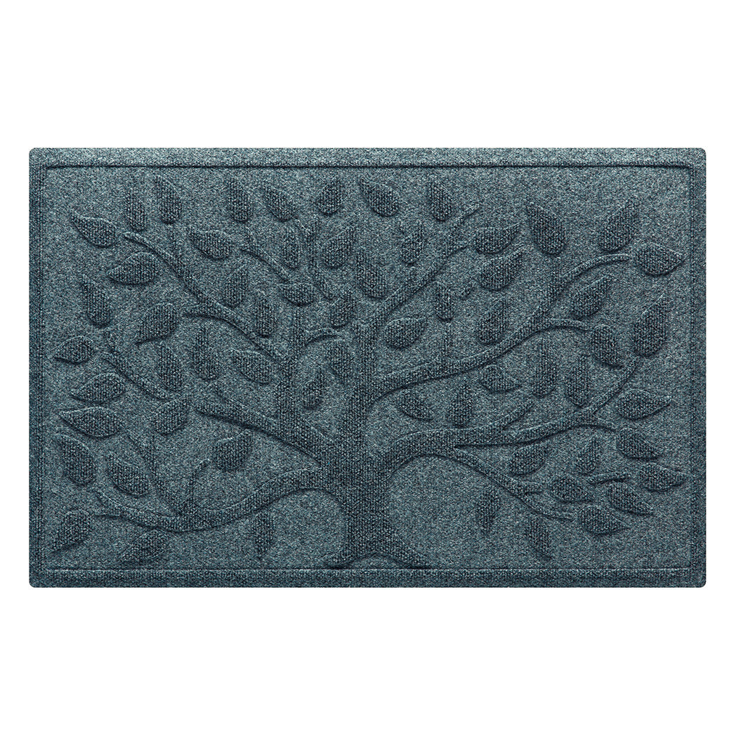 Overhead of WaterHog's Tree of Life durable doormat featuring the large blooming tree on a soft blue, eco-friendly surface, shown on an all-white, flat background.