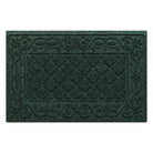 Overhead of a classic forest green WaterHog outdoor doormat in the Tristan design of a centered diamond pattern bordered by an ornate scroll design for a timeless, hard-working doormat.