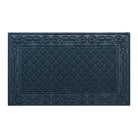 A large WaterHog Tristan doormat in navy with a two-part design - an ornate scroll pattern boarding the classic diamonds pattern - all backed by durable rubber backing.