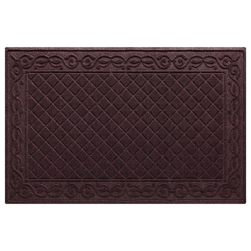 Overhead of WaterHog Tristan doormat in the size 4'x6', a deep red color, and a two-part design of a diamond pattern bordered by a scroll design all backed by WaterHog's incredibly durable rubber backing.