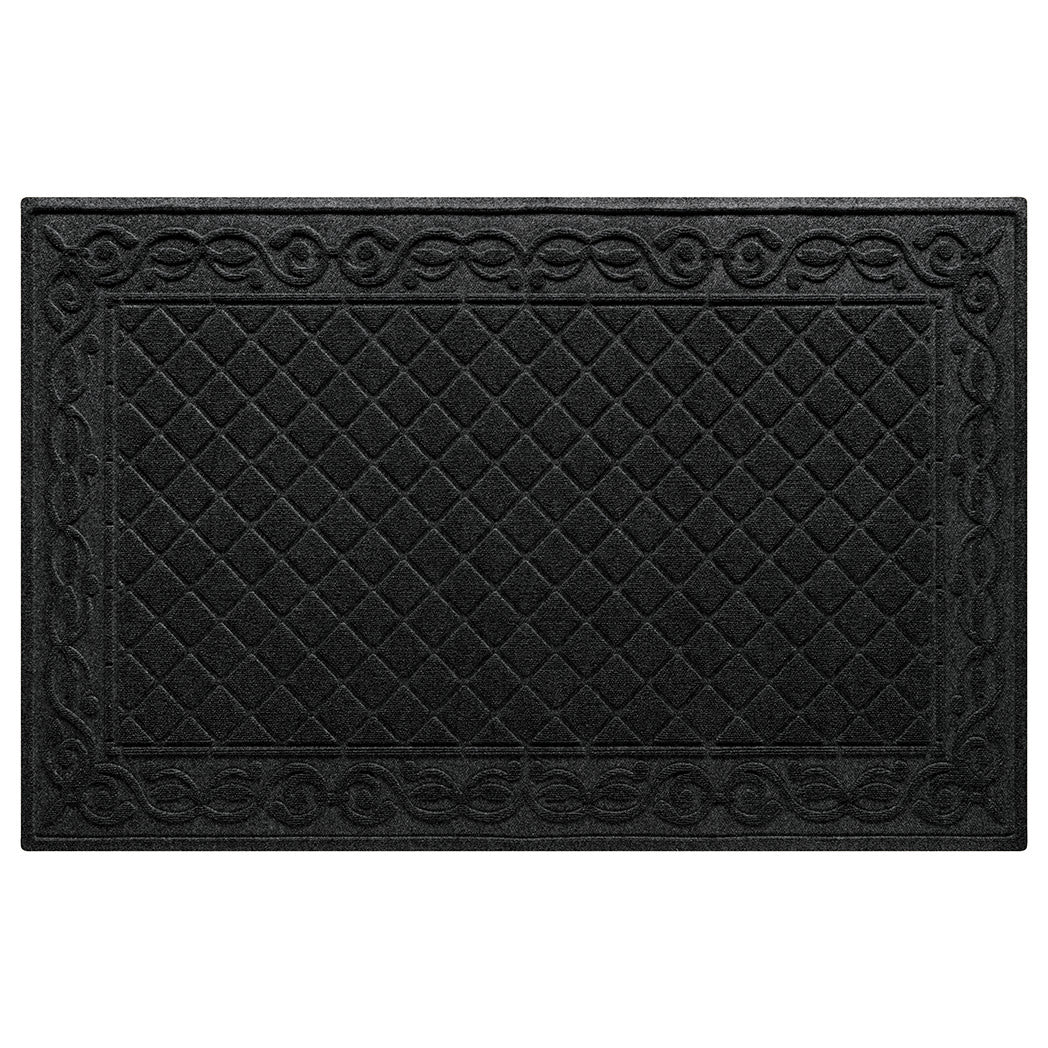 An extra large Tristan doormat in a deep, dark grey color that features an ornated border design that encases the classic diamond design in the center for a timeless mat design on one that's going to work as hard.