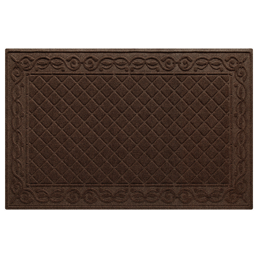 An overhead of a 4'x6' WaterHog Tristan indoor/outdoor brown doormat that features the diamond pattern with an ornate border, shown on a white background.