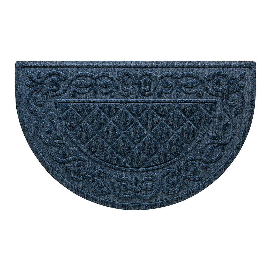 A WaterHog Tristan Half-Round doormat in a classic deep navy with a two-part design - an ornate scroll pattern boarding the classic diamonds pattern - all backed by durable rubber backing.