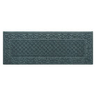 A WaterHog runner in the Tristan all-weather mat design shown in a deep navy color with a two-part design - an ornate scroll pattern boarding the classic diamonds pattern.