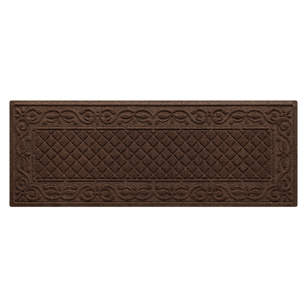 A dark brown WaterHog runner in the Tristan all-weather mat design with a two-part design - an ornate scroll pattern boarding the classic diamonds pattern, shown on  a white background.