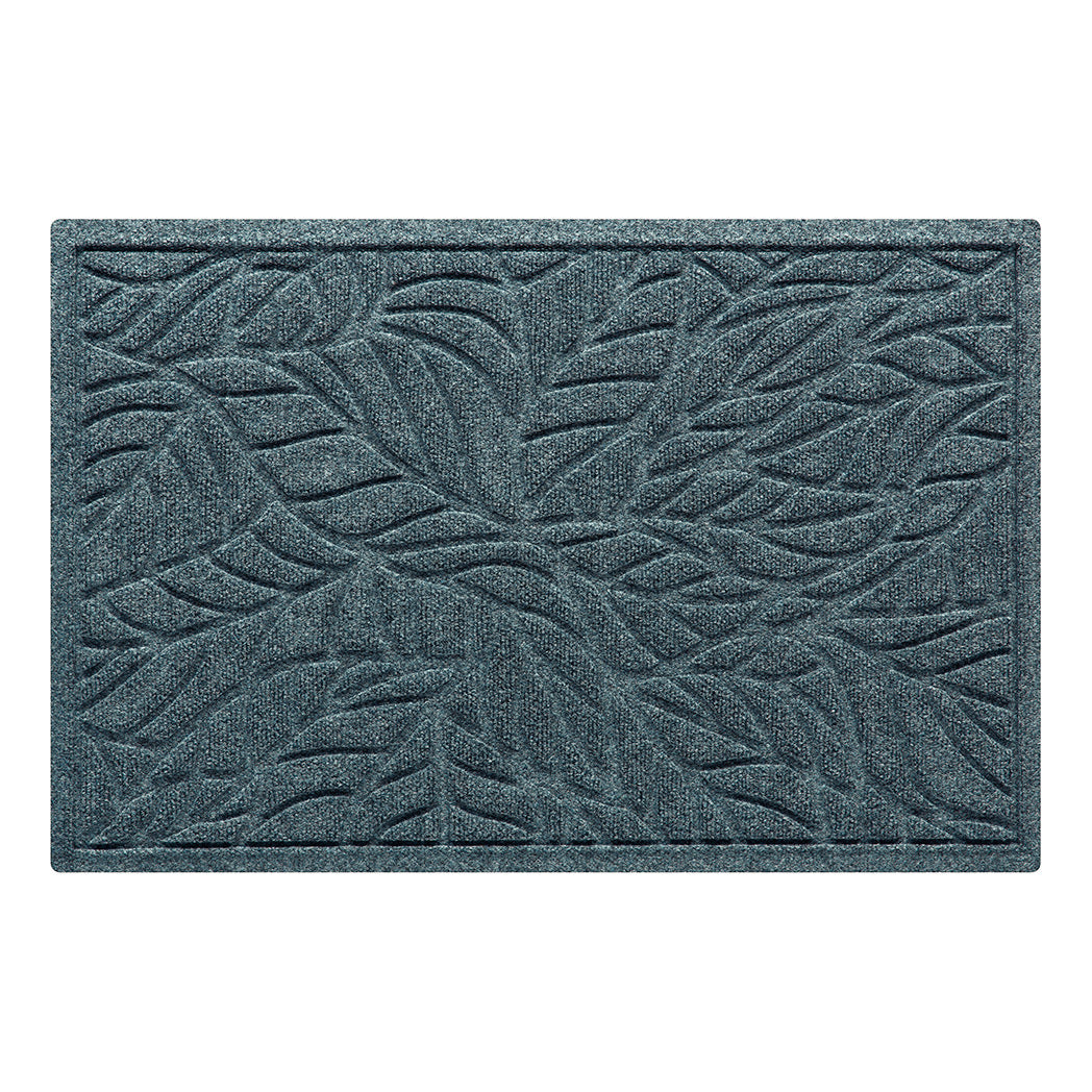 An overhead shot of a medium WaterHog all-weather doormat in a bi-level tropical leaf pattern made from eco-friendly fibers and in-house, durable rubber, shown on a white background.