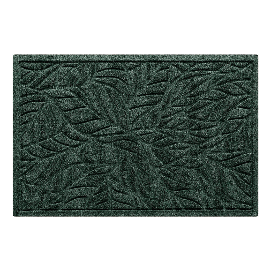 An overhead view of a 2x3 foot indoor/outdoor WaterHog doormat in a forest green color with a bi-level tropical leaf design and a raised border shown on a white background.