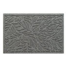 An overhead grey WaterHog single-door doormat in a bi-level tropical leaf pattern made from eco-friendly fibers and in-house rubber - all made in the USA.